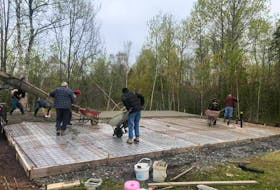 A slab is poured in Eskasoni for the new home of the Red Tribe Boxing Club on Thursday.