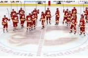  Calgary Flames take to the ice after their last game of the season against the Vancouver Canucks in NHL action at the Scotiabank Saddledome in Calgary on Wednesday, May 19, 2021.