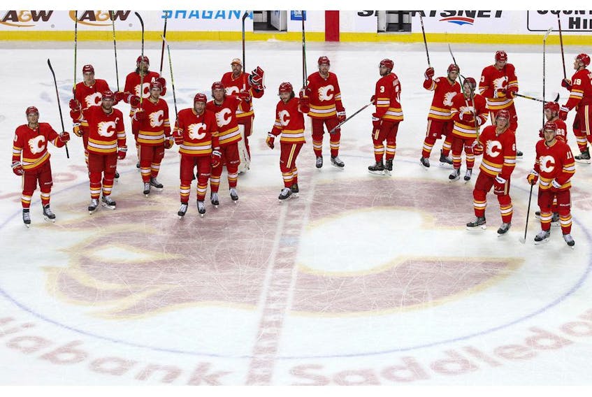 Calgary Flames take to the ice after their last game of the season against the Vancouver Canucks in NHL action at the Scotiabank Saddledome in Calgary on Wednesday, May 19, 2021.