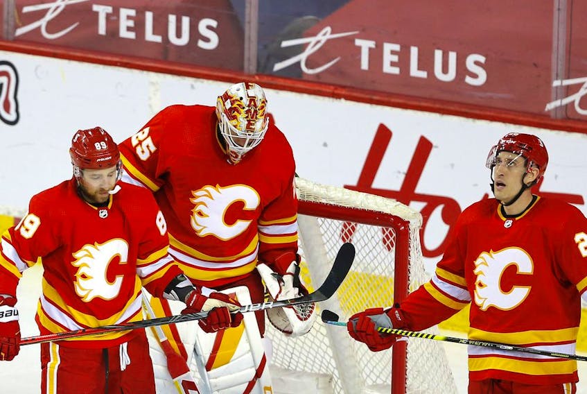 Flames goalie Jacob Markstrom reacts after surrendering a goal during a game against the Winnipeg Jets at the Scotiabank Saddledome in this photo from March 29.