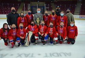 Jason Simmonds/Journal Pioneer
Team Red (Novus) won the inaugural Alfie Cup at Credit Union Place in Summerside last week. 
Team Red defeated Team White 3-1 in the championship game of a spring hockey program for girls in the under-11 and under-13 age categories. The trophy honoured Blaine (Alfie) Gallant, a longtime skate sharpener at Credit Union Place. Members of Team Red are, front row, from left: Bridget Cheverie, Ciarra Price, Maria Desrosier, Claire Dowling, Sadie Desjardins, Clair Morrissey, Brynn McNeill and Ellie Ballum. Back row: Curtis McNeill (head coach), Taylyn Perry, Maria MacDougall, Gallant, Marty Compton, Gabby Noye, Jaime Perry (assistant coach), Emma Ballum and Lauren Clark (assistant coach).