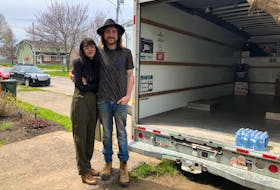 Anne Dennis and Gianni Rizzetto stand beside the U-Haul they rented last week to move their belongings after feeling intimidated by their landlord and his employees in what the couple considered an illegal eviction from their Sydney rental unit. NICOLE SULLIVAN/CAPE BRETON POST 