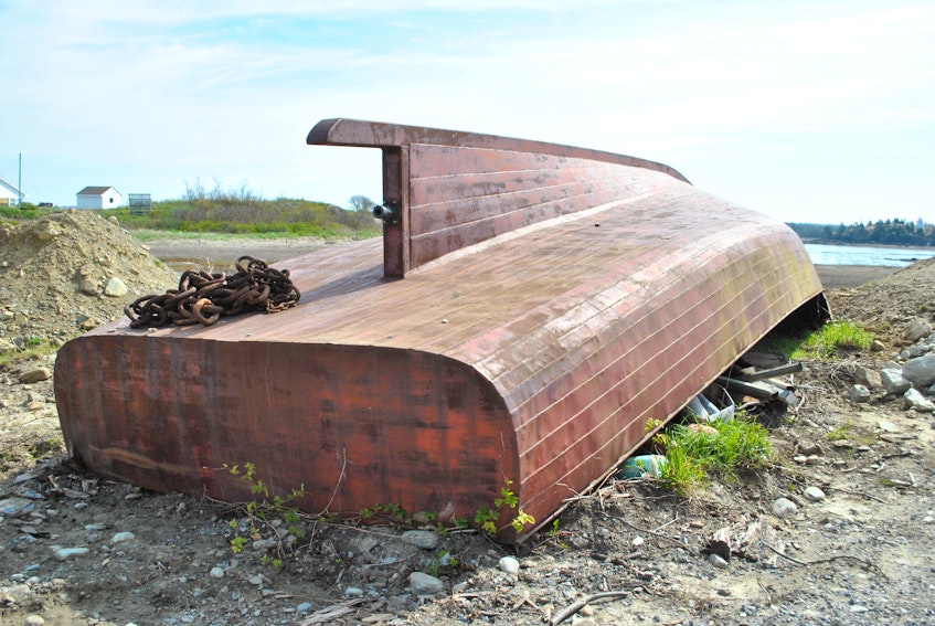 A unique steel planked boat hull built decades ago by the late Leonard d’Eon will become outside décor for the Boatskeg Distillery in Lower West Pubnico. Kathy Johnson photo