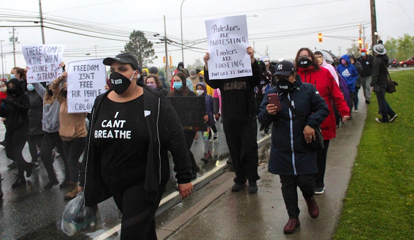 Selah Best, front, a mother from Whitney Pier, marches to the Cape Breton Regional Police Service headquarters on June 3, 2020 during a protest against racism and police violence against minorities. FILE PHOTO/CAPE BRETON POST