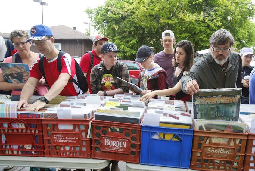 A file photo from 2018 shows bargain-hunters at the Great Glebe Garage Sale.
