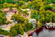 The seven-acre property listed for $24 million just outside of Port Carling is more a mansion compound than a cottage — with two lodges, a swimming pool, home theatre and tennis court — that overlooks 629 feet of Lake Muskoka.