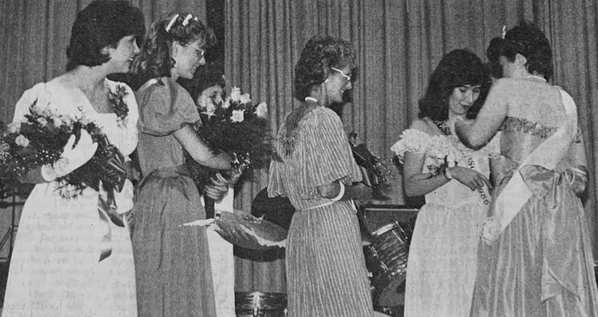 Julianne Doucette was crowned Princess Windsor 1986. Pictured crowning her was Princess Windsor 1985 Karen Hanson. Also pictured, from left, were Susan Ivey, second lady-in-waiting, Nancy Nelson, first lady-in-waiting, and Janet Boyd, the princess co-ordinator. - File Photo