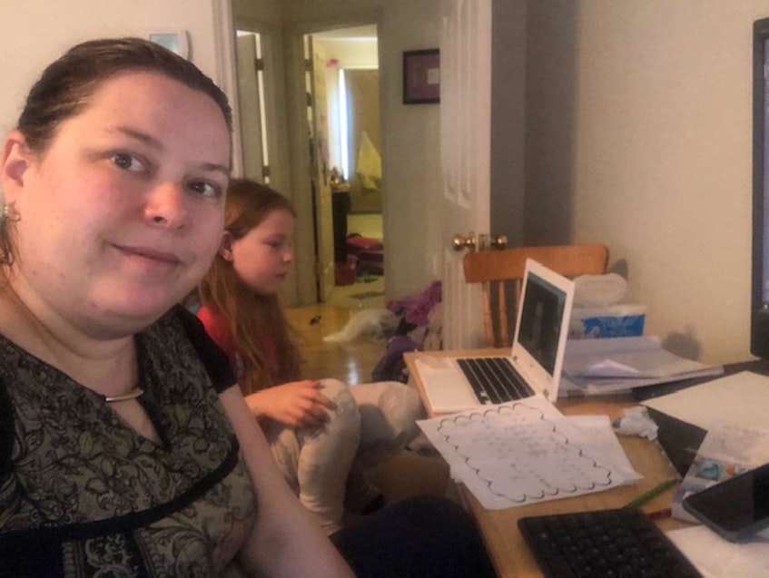 Roxanne MacLean and her daughter Addy, working on school work in their HRM home. - Contributed