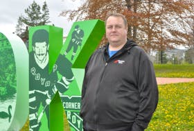 Graphic designer Gary Millband of Speedpro Signs is happy that he could include an image of his brother-in-law, Craig Kennedy, a former Corner Brook Royals captain, in the new Corner Brook sign.