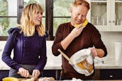 Actor Jesse Tyler Ferguson, right, and chef and recipe developer Julie Tanous spun the food of their friendship into a blog and cookbook. 