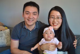 Michael Wang, left, and his wife, Ling Chen, are grateful to the staff in the Queen Elizabeth Hospital’s neonatal unit for all they did for their daughter, Irelia, when she was born more than six weeks prematurely.
