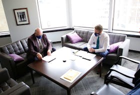 FOR NEWS STORY:
Nova Scotia Premier Iain Rankin and Dr. Robert Strang, the chief medical officer of health, left, confer before their news conference on COVID19 in Rankin's office Friday May 28, 2021.

TIM KROCHAK PHOTO