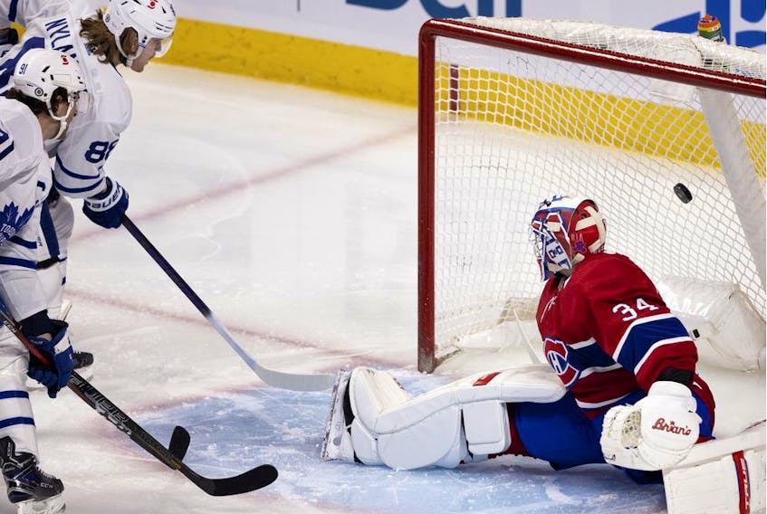 Toronto Maple Leafs centre William Nylander scores a power-play goal on Montreal Canadiens' goaltender Jake Allen during first-period action in Montreal on Wednesday, April 28, 2021.