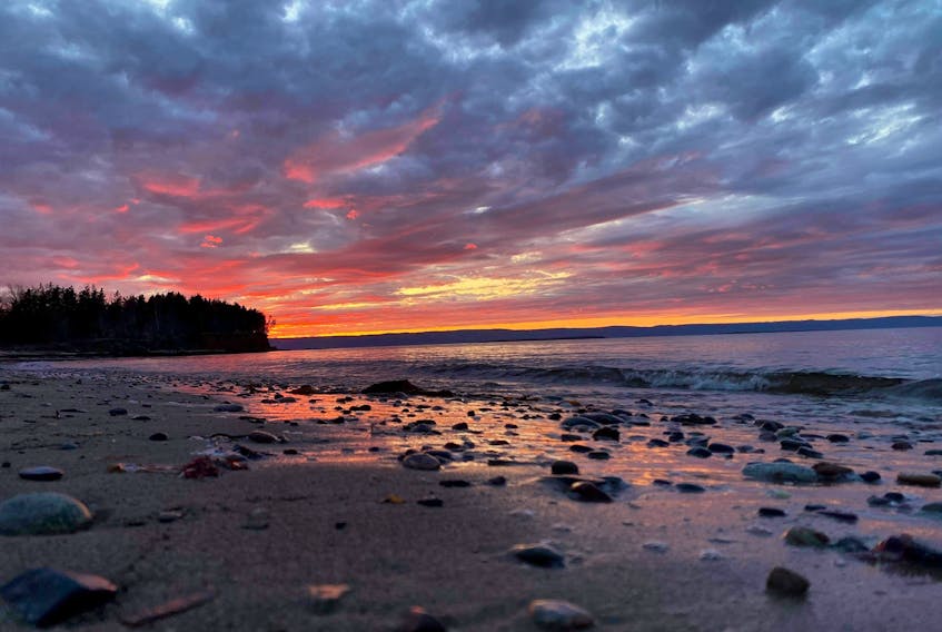 The tide was out, and the sun had dipped below the horizon when Jess Boudreau snapped this magical photo in Point Aconi, Cape Breton. The late-day light bouncing off the mottled clouds created a pretty pastel palette. 
Thank you for this colourful photo, Jess.