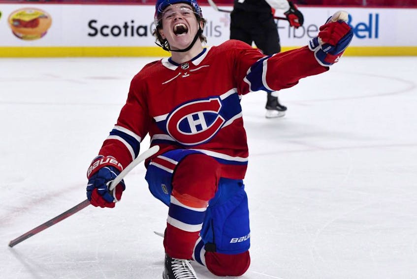 Montreal Canadiens forward Cole Caufield reacts after scoring the winning goal against the Ottawa Senators during the overtime period at the Bell Centre. This was Caufield's first NHL goal. 
