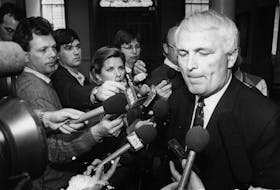 PEOPLE - DON CAMERON - NOVA SCOTIA PREMIER - Premier Donald Cameron faces questions from the media on May 25, 1992 Peter Parsons Photo