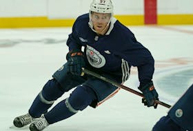 Edmonton Oilers captain Connor McDavid led the NHL in points entering Monday's play. He had 87 while his teammate, Leon Draisaitl, was second with 71.
