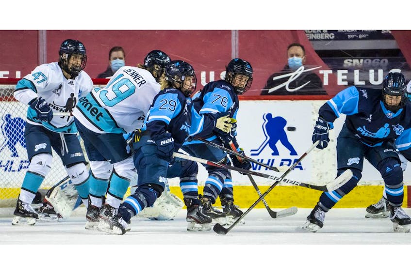 Crowded net front In the final game of the Professional Women’s Hockey Players  Association Secret Dream Gap Tour at the Scotiabank Saddledome on Sunday, May 30, 2021. 