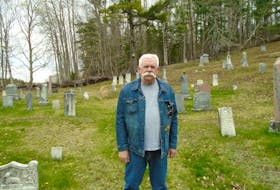 Cemetery sleuth Ric Noble is shown at a cemetery in Tremont, where he has photographed and recorded information about gravesites. Noble said the work he does recording information about cemeteries online is preserving history that would otherwise be lost. - Contributed