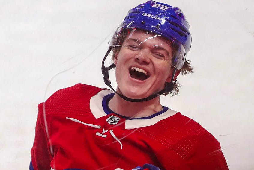 Canadiens' Cole Caufield celebrates his game-winning goal during overtime against the Toronto Maple Leafs in Montreal Monday, May 3, 2021.