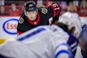  Ottawa Senators right wing Drake Batherson eyes there face-off during first period NHL action against the Winnipeg Jets at the Canadian Tire Centre.