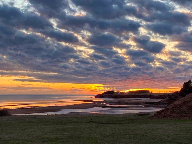 The sun was setting when Ian Wallis snapped this lovely photo at the golden hour of the day in Argyle Shore PEI. Nothing beats a good sunset, the colours, the clouds and the ambiance…thank you for the photo Ian.