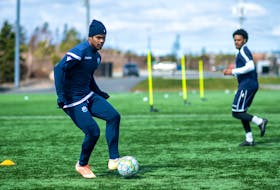 Eriks Santos (middle) and the HFX Wanderers conduct a passing drill during the team's training camp last month at the Soccer Nova Scotia facility in Clayton Park. - Dylan Lawrence / HFX Wanderers