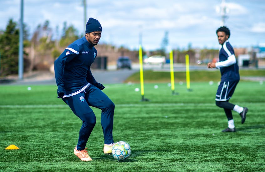 Eriks Santos (middle) and the HFX Wanderers conduct a passing drill during the team's training camp last month at the Soccer Nova Scotia facility in Clayton Park. - Dylan Lawrence / HFX Wanderers