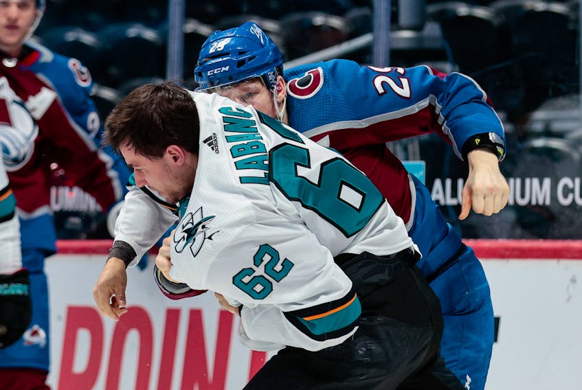 Colorado Avalanche’s  Nathan MacKinnon  fights San Jose Sharks’  Kevin Labanc (62) during an NHL game on April 30.  Isaiah J. Downing-USA TODAY Sports