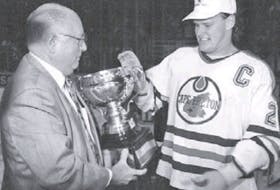 Cape Breton Oilers co-captain Dan Currie, right, accepts the Calder Cup from American Hockey League president Jack Butterfield on May 30, 1993, at Centre 200 in Sydney. Currie played five seasons with the Oilers and is the Cape Breton club’s all-time leading goal scorer. CAPE BRETON POST FILE