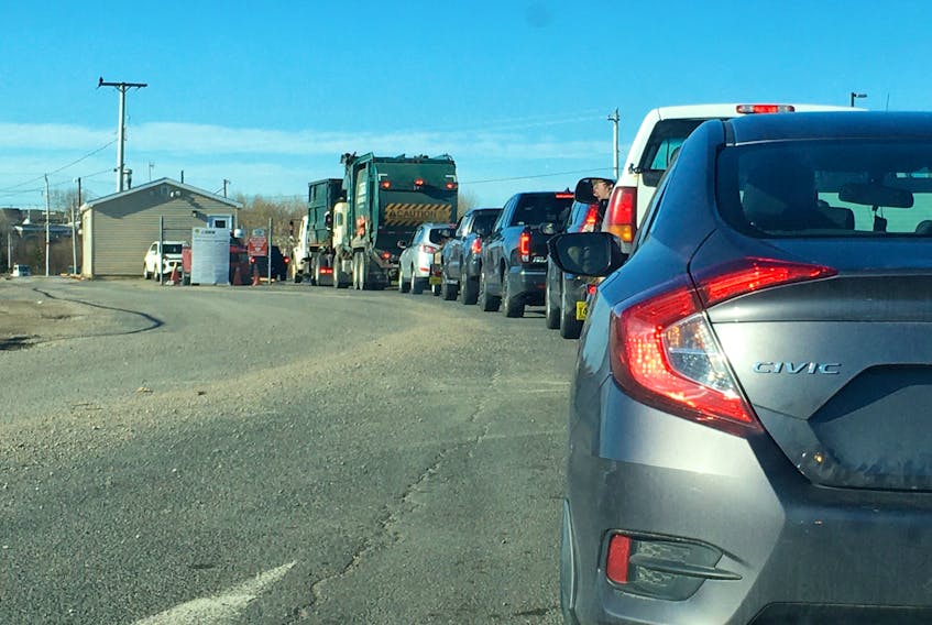 Vehicles wait to enter the Sydney Port Access Road waste management facility on Tuesday. IAN NATHANSON/CAPE BRETON POST