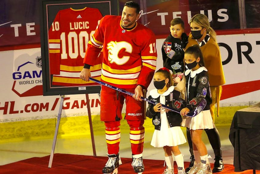 Calgary Flames forward Milan Lucic is honoured for reaching 1,000 NHL games played before taking on the Ottawa Senators at the Scotiabank Saddledome in Calgary on Monday, April 19, 2021. 