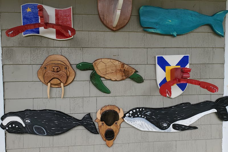 Besides making fun fishing equipment, Len Laufman and his wife, Cindy Baird, put their shared love of woodworking to use by making unique wooden pieces. They often draw on inspiration from their home in Yarmouth County in their wood folk art pieces, layering locally-sourced pine to create three-dimensional designs. - Contributed