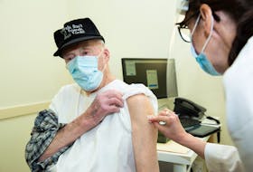 Thomas Mckinnon rolled up his sleeve Tuesday, March 9, to receive his COVID-19 vaccine. He is one of the first Nova Scotians to receive his COVID-19 vaccine through a pharmacy clinic. - Communications Nova Scotia