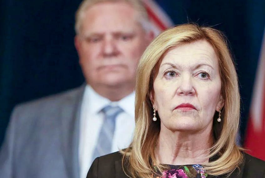  Health Minister Christine Elliott, with Premier Doug Ford behind her, said on Wednesday that Ontario would not be allowing organized sports “based on the medical advice that we’ve received from the experts.” POSTMEDIA FILES