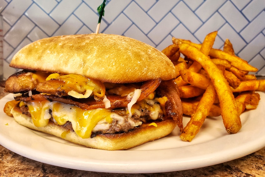 Myrtle and Rosie’s Café went into Burger Wars 2021 as the reigning champions after the competition held annually in April was cancelled in 2020 due to the COVID-19 pandemic. This year, Myrtle and Rosie’s Café tied Valley’s BFF in New Minas for first with The Grizzly Burger. - Contributed
