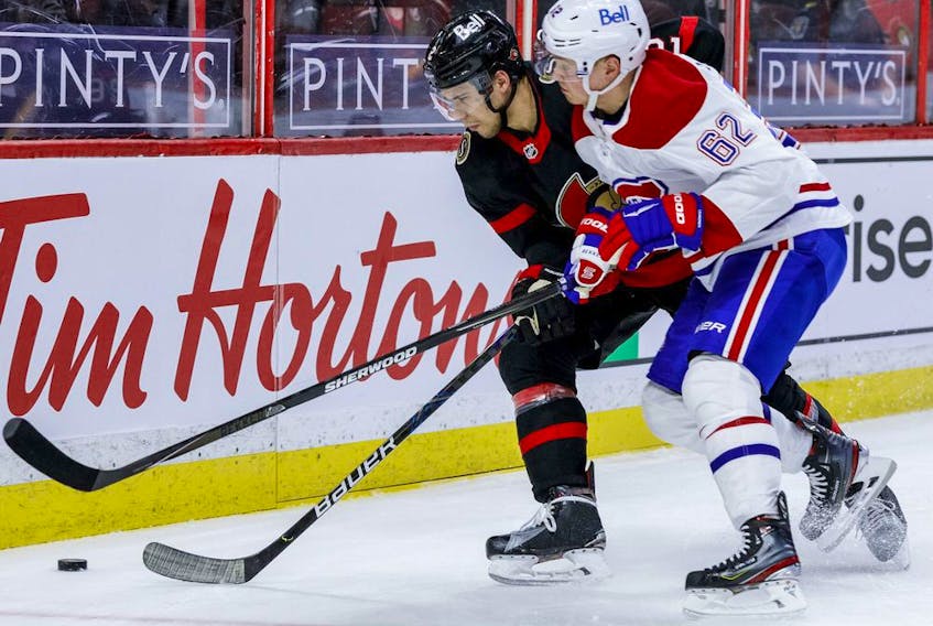 Ottawa Senators defenceman Artem Zub (2) battles with Montreal Canadiens left wing Artturi Lehkonen (62).