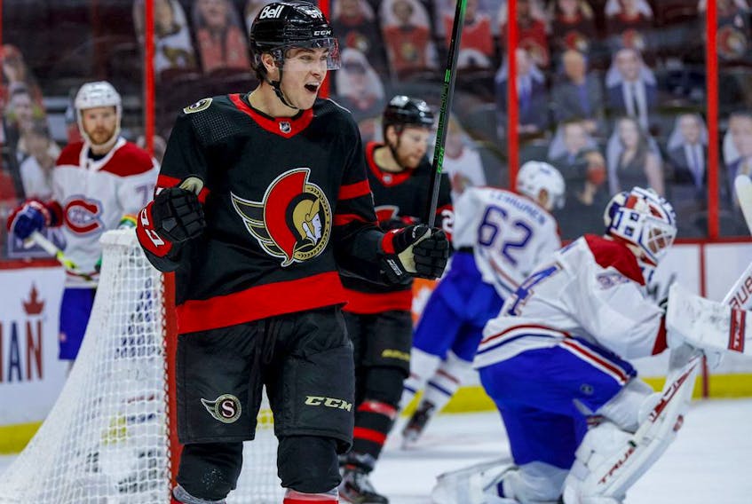 Ottawa Senators centre Shane Pinto (57) celebrates his first NHL goal against the Montreal Canadiens during the first period.
