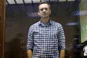  Russian opposition leader Alexei Navalny attends a hearing to consider an appeal against an earlier court decision to change his suspended sentence to a real prison term, in Moscow, Russia February 20, 2021.