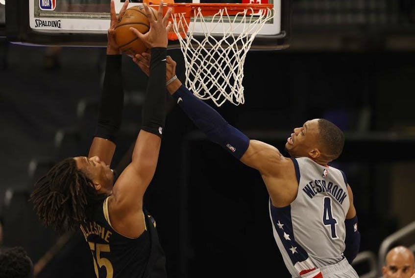  Toronto Raptors forward Freddie Gillespie (55) and Washington Wizards guard Russell Westbrook (4) go after the rebound during the second half at Amalie Arena.