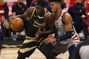 Toronto Raptors forward Pascal Siakam drives to the basket as Washington Wizards center Daniel Gafford defends during the second half at Amalie Arena. 