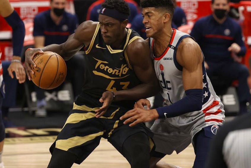 Toronto Raptors forward Pascal Siakam drives to the basket as Washington Wizards center Daniel Gafford defends during the second half at Amalie Arena. 