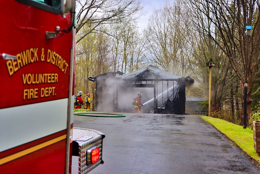 Flames were venting through the roof of this garage on Lawrence Avenue in Berwick shortly before 4 p.m. on May 6. – Adrian Johnstone