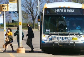 Halifax Transit passengers disembark from a bus at the Bridge Terminal in Dartmouth on Monday, May 3, 2021.