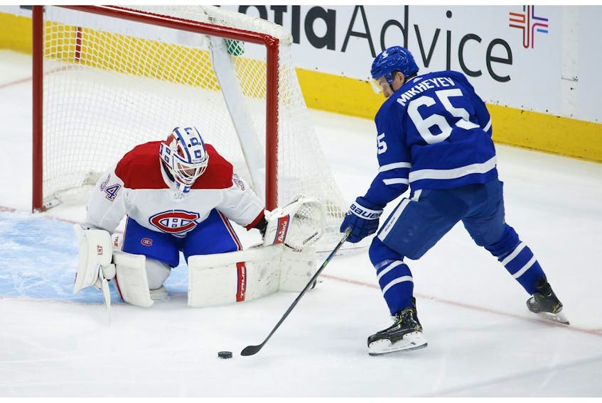 Toronto Maple Leafs Ilya Mikheyev RW (65) dangles the puck in front of Montreal Canadiens Jake Allen G (34) during second period action in Toronto on Thursday May 6, 2021. Jack Boland/Toronto Sun/Postmedia Network