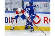 Montreal Canadiens Josh Anderson RW (17) bangs into Toronto Maple Leafs Mitch Marner RW (16) during second period action in Toronto on Thursday May 6, 2021. Jack Boland/Toronto Sun/Postmedia Network