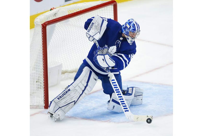 Toronto Maple Leafs Jack Campbell G (36) makes a save and fires the puck up the ice during second period action in Toronto on Thursday May 6, 2021. Jack Boland/Toronto Sun/Postmedia Network