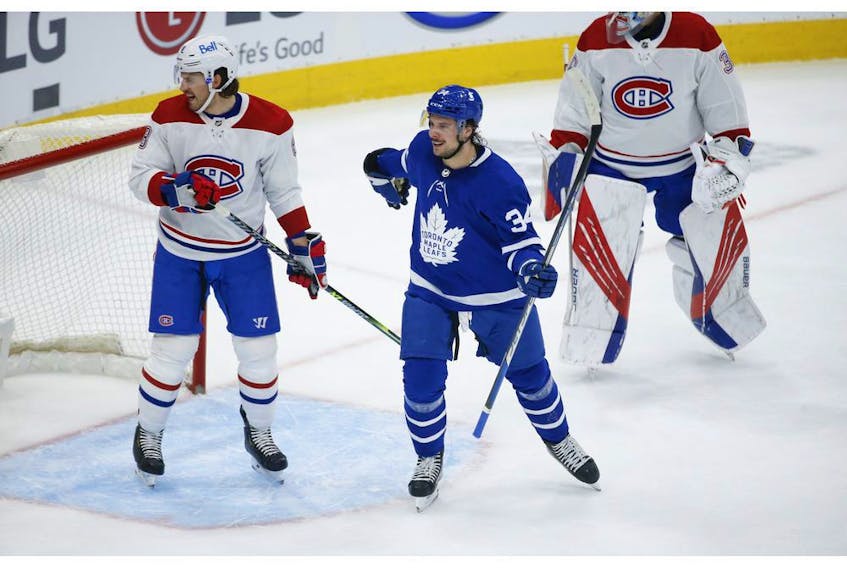 Toronto Maple Leafs Auston Matthews C (34) points to the net and teammate Mitch Marner's goal during first period action in Toronto on Thursday May 6, 2021. Jack Boland/Toronto Sun/Postmedia Network