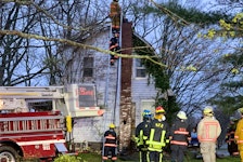 Firefighters battled a stubborn fire that started in a chimney in this Lockhartville home May 8.