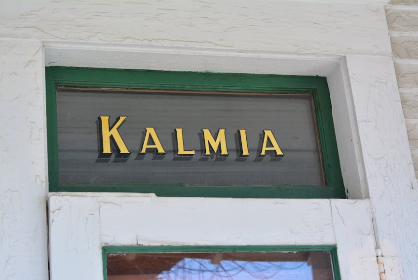 The gold gilt lettered name Kalmia is etched in the transom, 